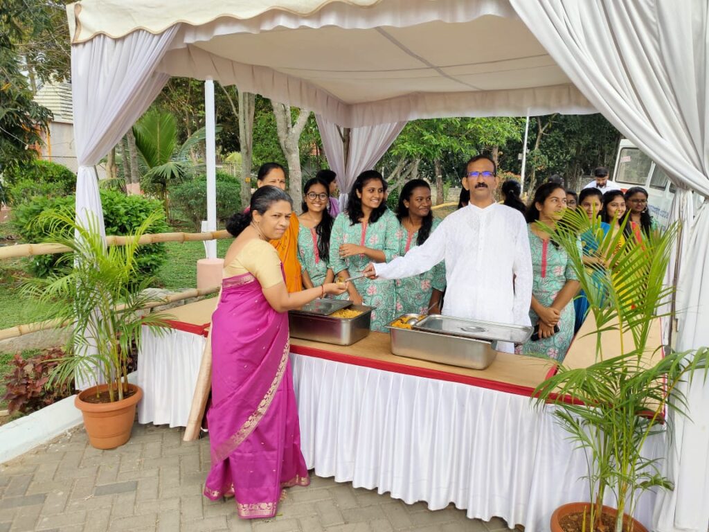 Offering of Prasadam to devotees