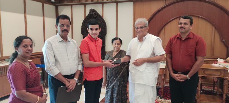 President Dr. D Veerendra Hegde and Hemavathi V Hegde felicitates Chinmay G K the Second Topper of the state
